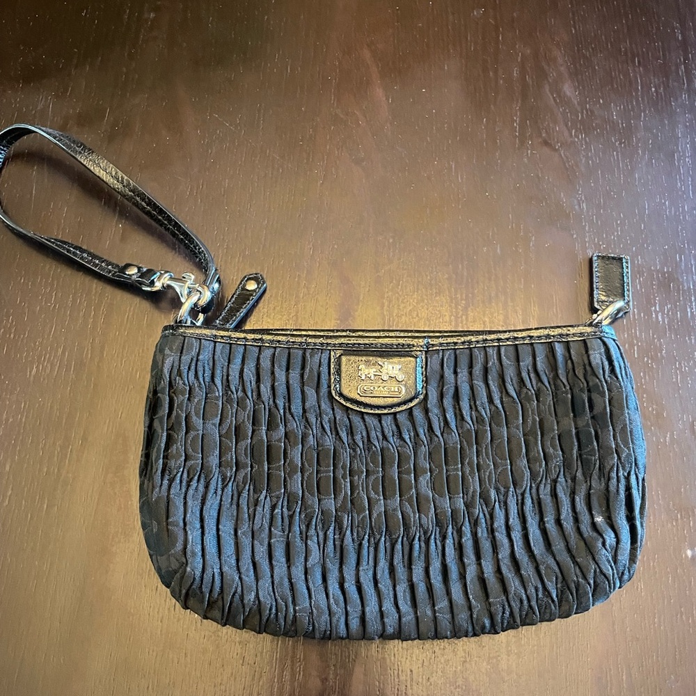 Coach Black Wristlet with ruffled pattern